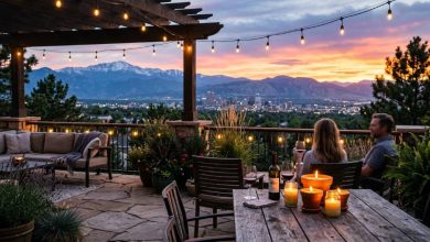 Outdoor patio in Denver with citronella candles during sunset and mountain backdrop
